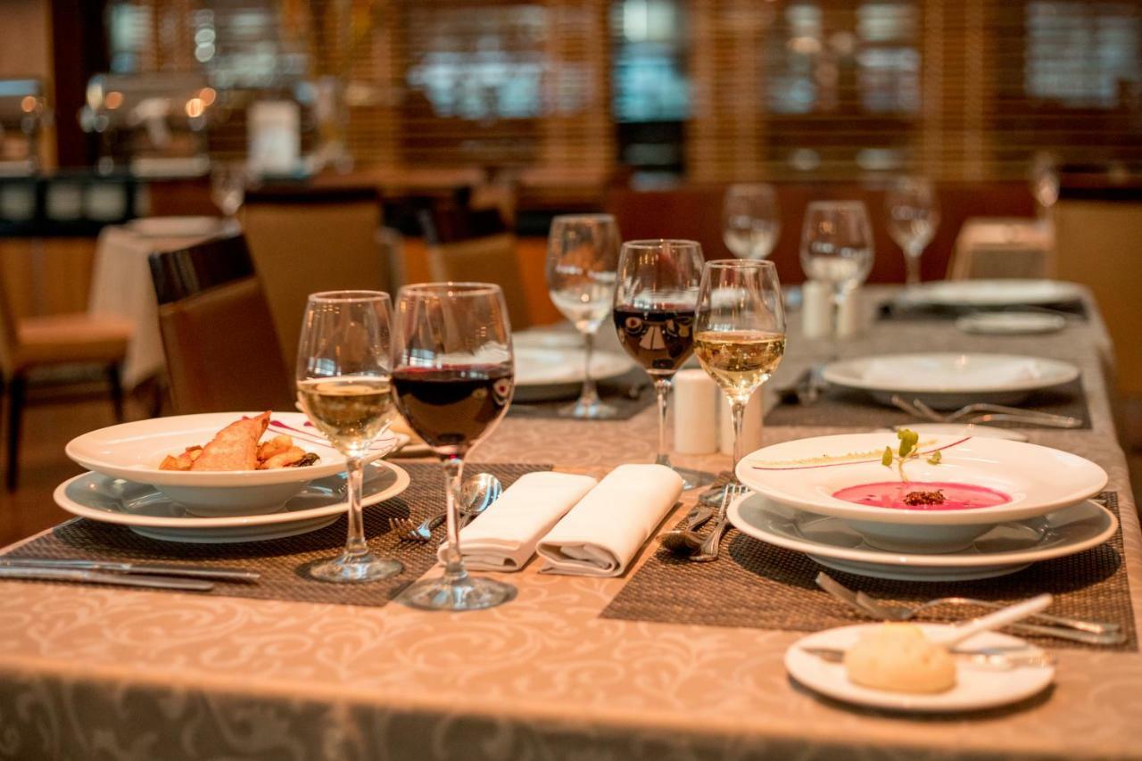 Mds Hotel Calama Ngoại thất bức ảnh A table set for dinner