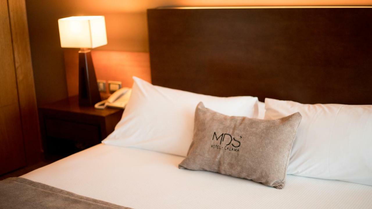 Mds Hotel Calama Ngoại thất bức ảnh A bed at the MÖS Hotel in Cologne, Germany