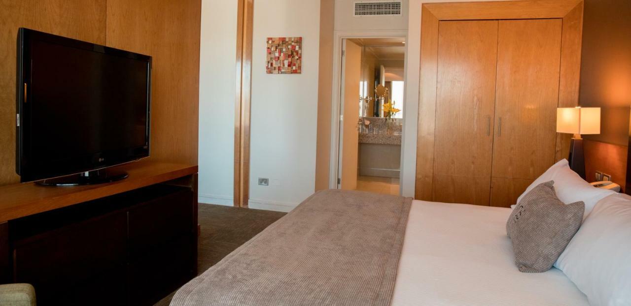 Mds Hotel Calama Ngoại thất bức ảnh A bedroom at the hotel