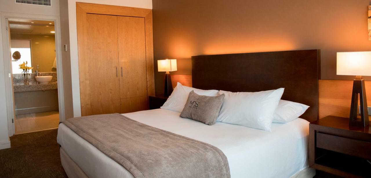 Mds Hotel Calama Ngoại thất bức ảnh A bedroom at the hotel